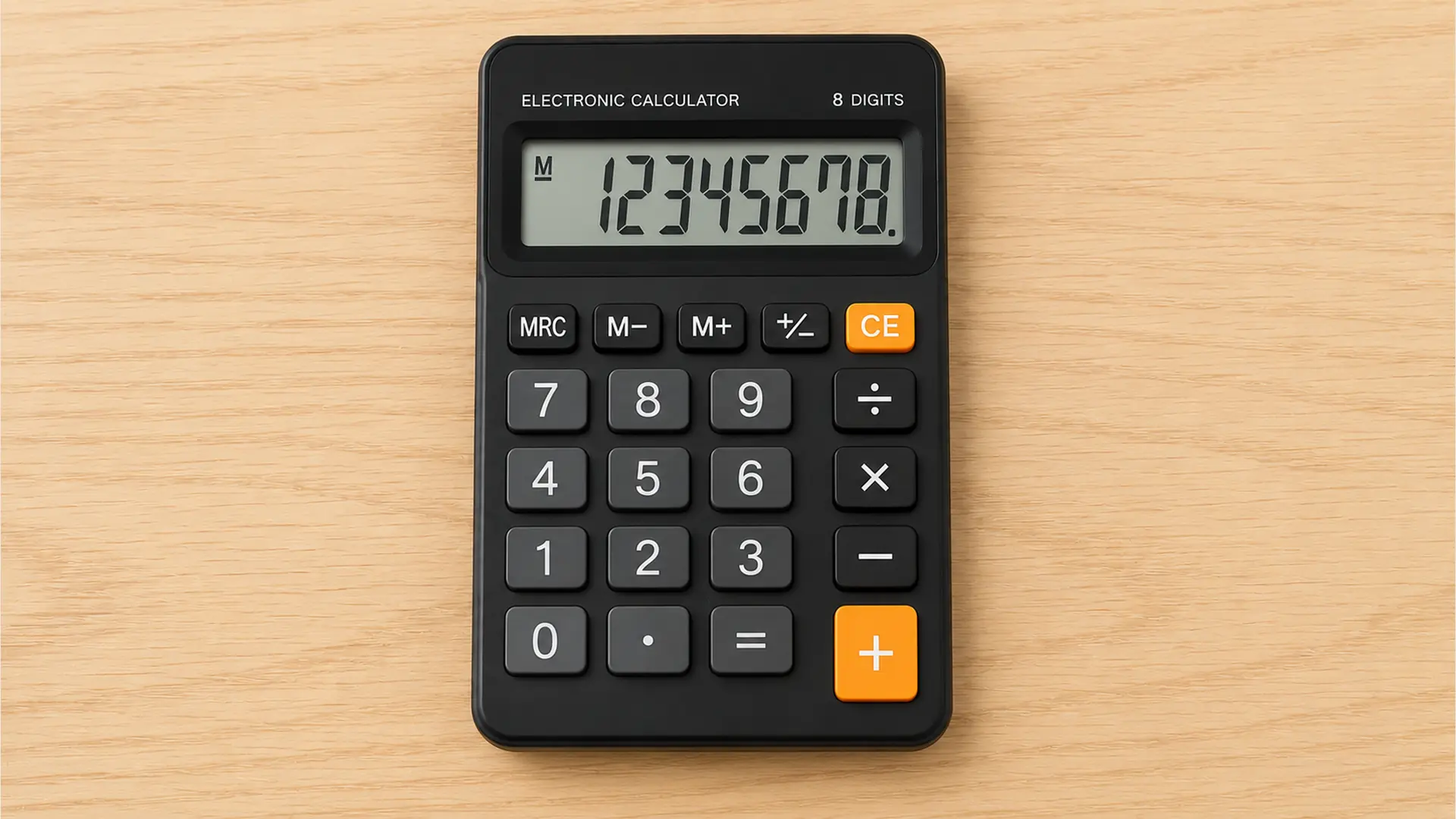 basic four-function calculator on a light wood desk with large display and clearly visible number and operation keys.