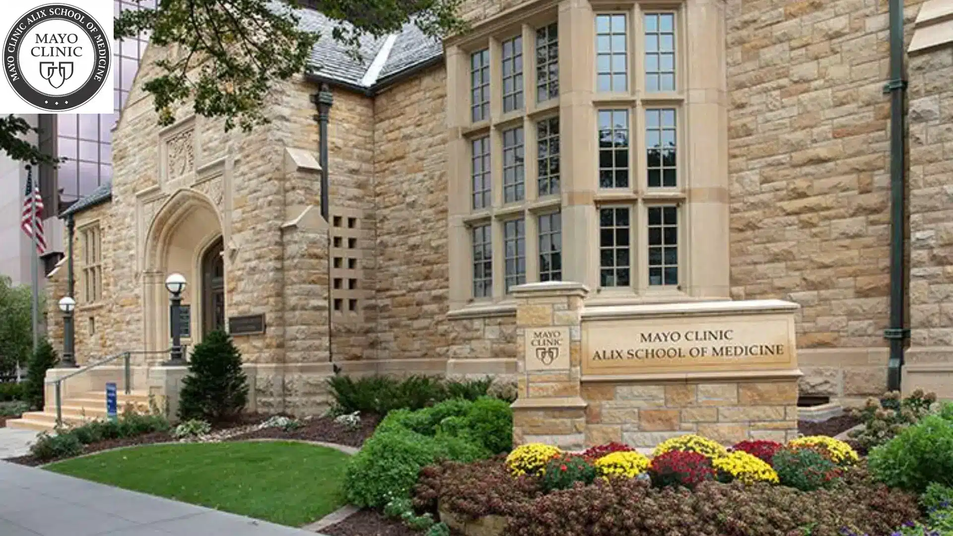 mayo clinic alix school of medicine stone building entrance with a garden with flowers