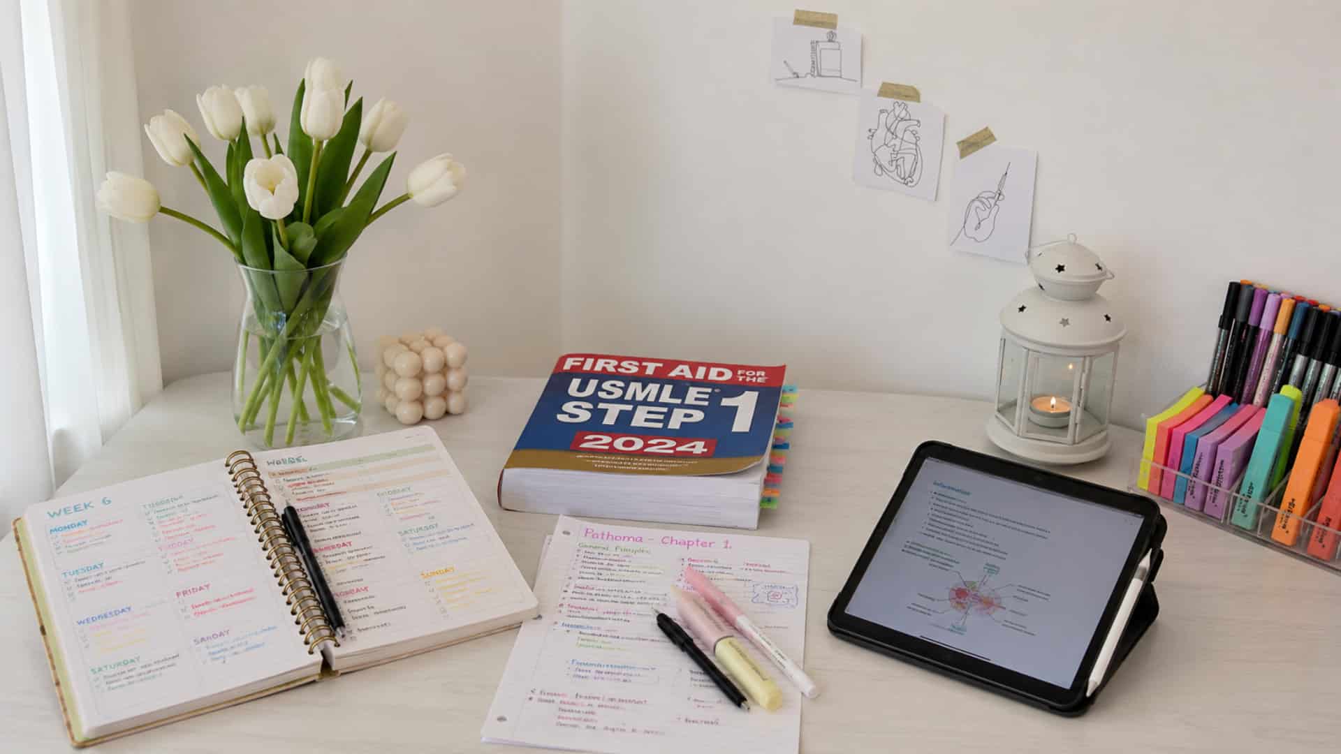 step 1 study schedule setup with usmle review book weekly planner notes tablet and organized medical study desk